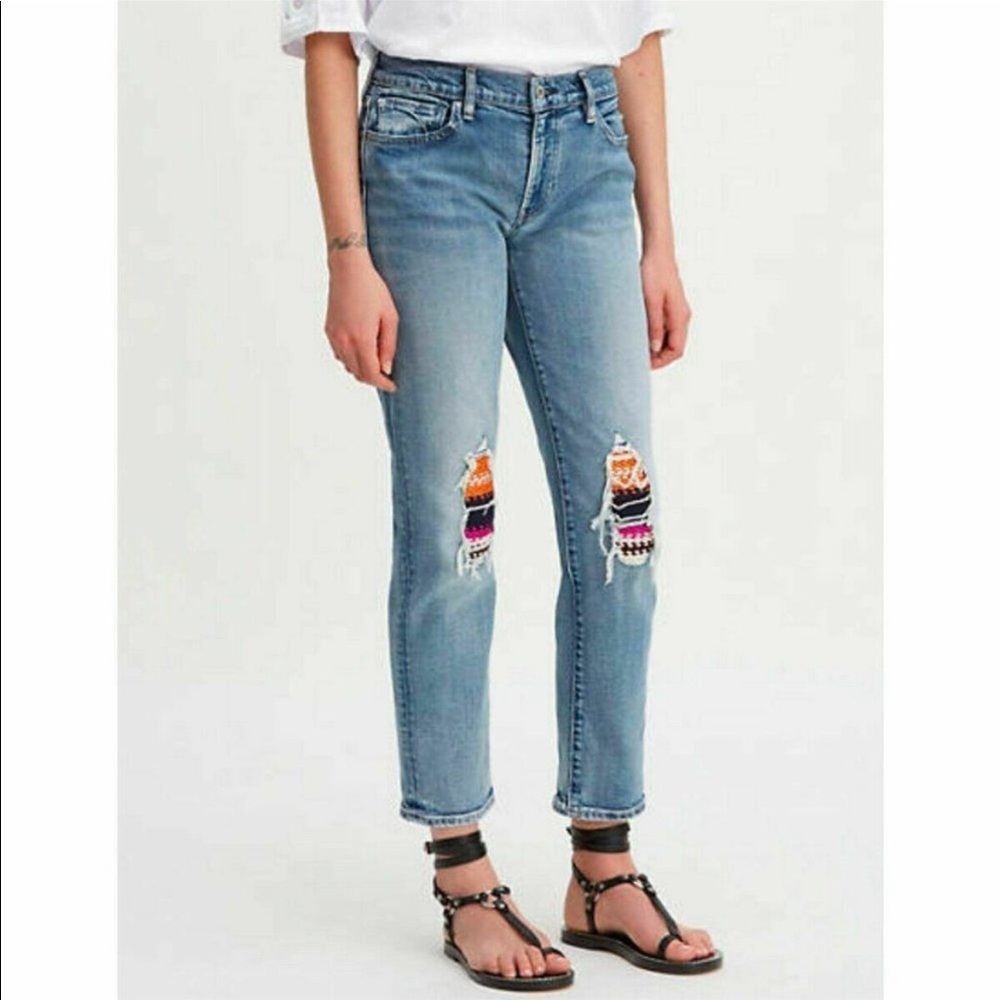 Levis rare boyfriend cut knit patched distressed knee jeans.